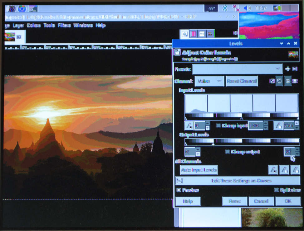 Raspberry PI - Xorg 16 - Gimp showing 'temple.jpg' editing 'Colors Levels' output to 0 - 63