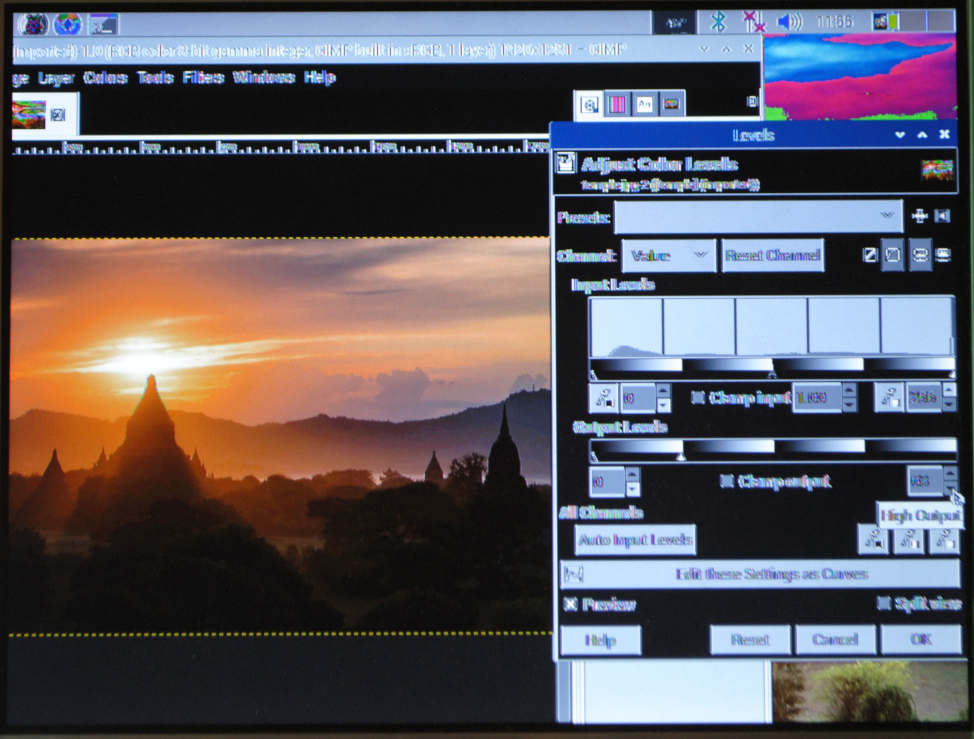Raspberry PI - Xorg 24 - Gimp showing 'temple.jpg' editing 'Colors Levels' output to 0 - 63